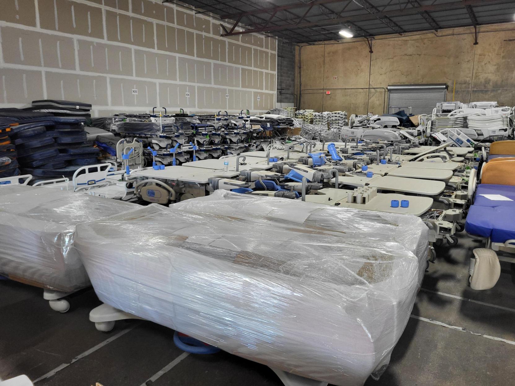 Warehouse.Wrapped_and_stored_beds.jpg